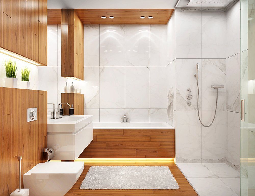 Modern bathroom with wood accents: white tiles, floating vanity, bathtub, shower, and recessed lighting.