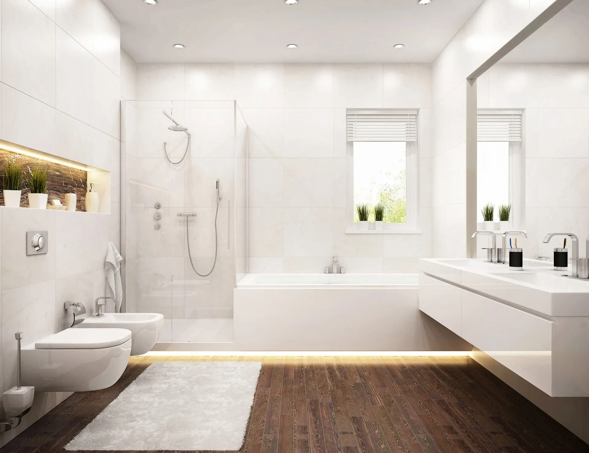 Modern all-white bathroom with wood floor, floating vanity, tub, toilet, shower, and window with plants.