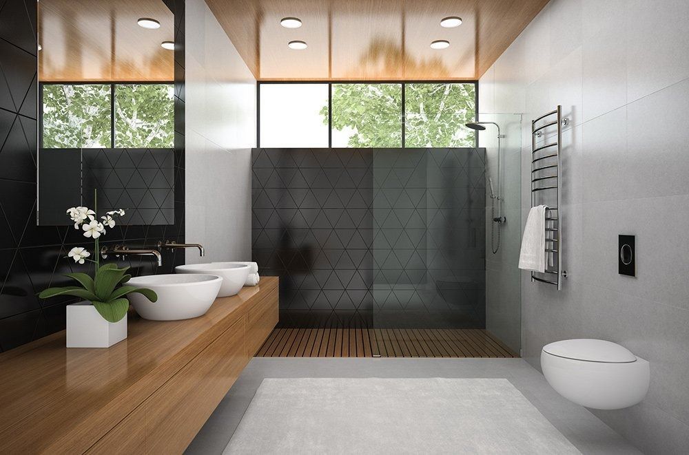 Modern bathroom with wooden accents, featuring two sinks, a toilet, shower, and large windows.