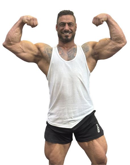 A man wearing a white tank top with the word binous on it