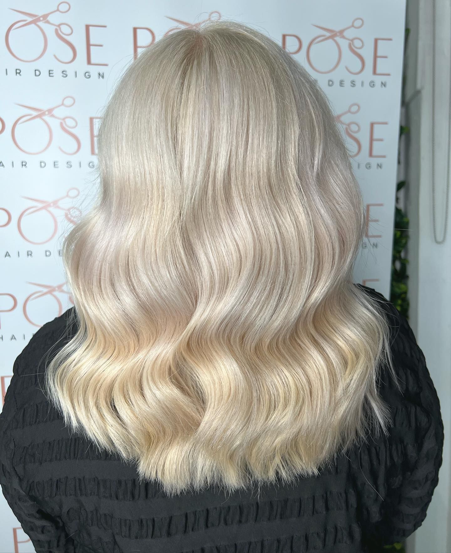 Back View of Long Wavy Platinum-Blonde Hair with Dark Roots Styled — Pose Hair Design in Orange, NSW