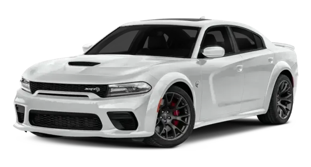 White Dodge Charger sedan with black accents, parked on a surface.