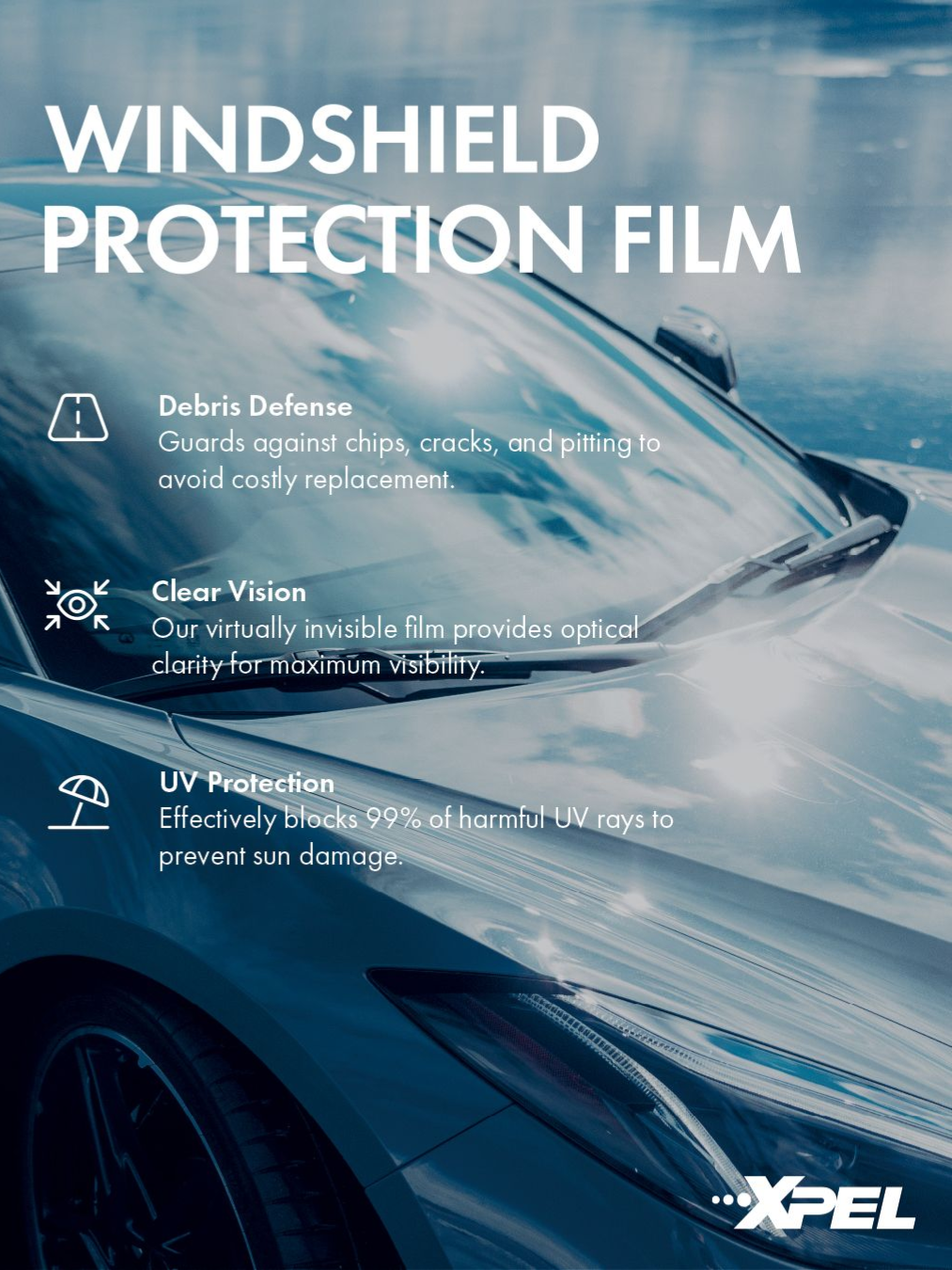 A car with a windshield protection film on it.