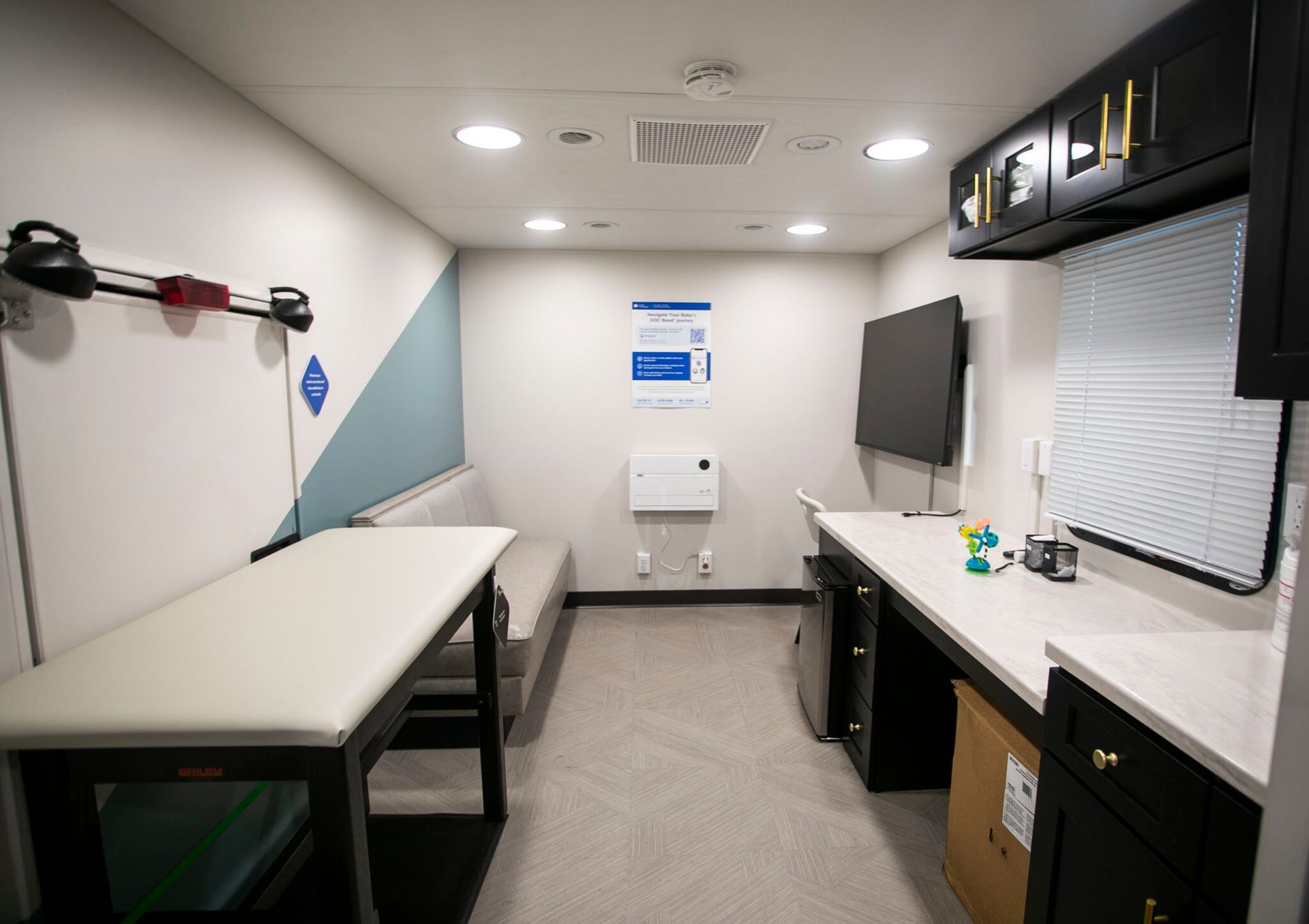 Clinical workstation area inside the Cranial Technologies mobile clinic.