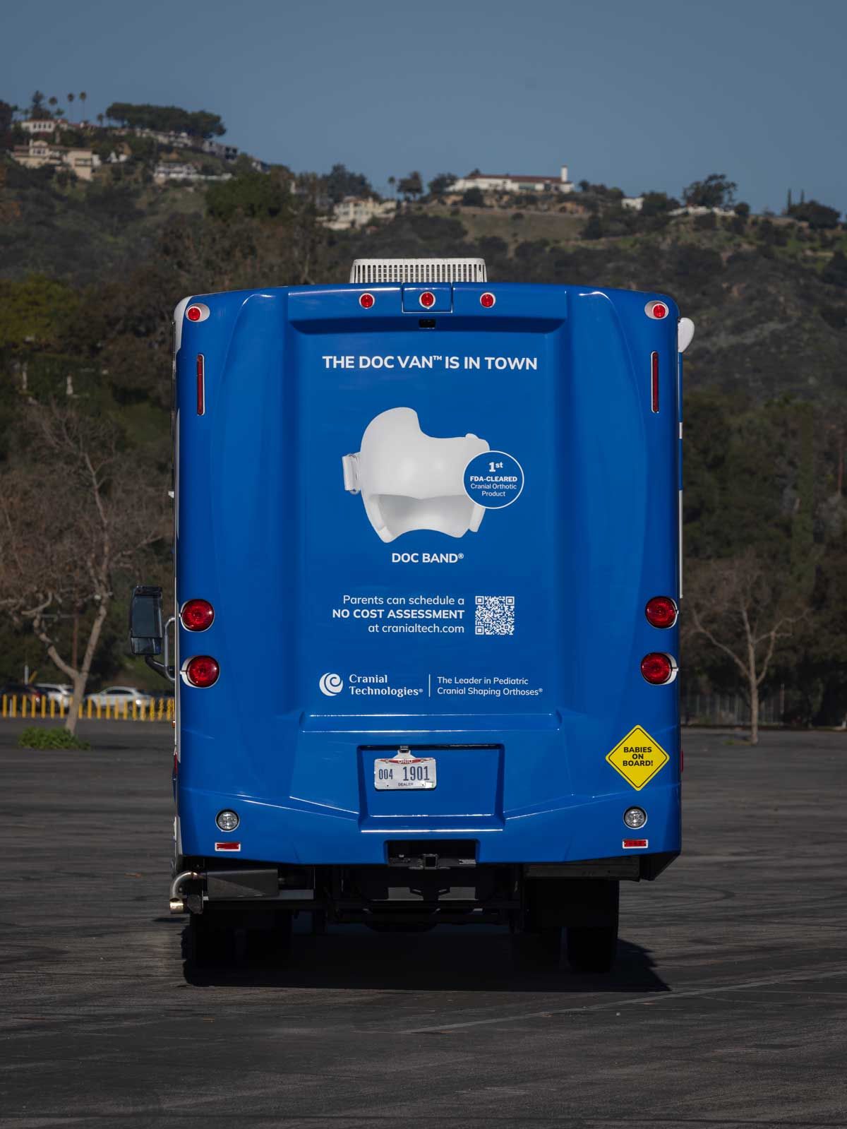 Rear view of the Cranial Technologies DOC Van mobile clinic.