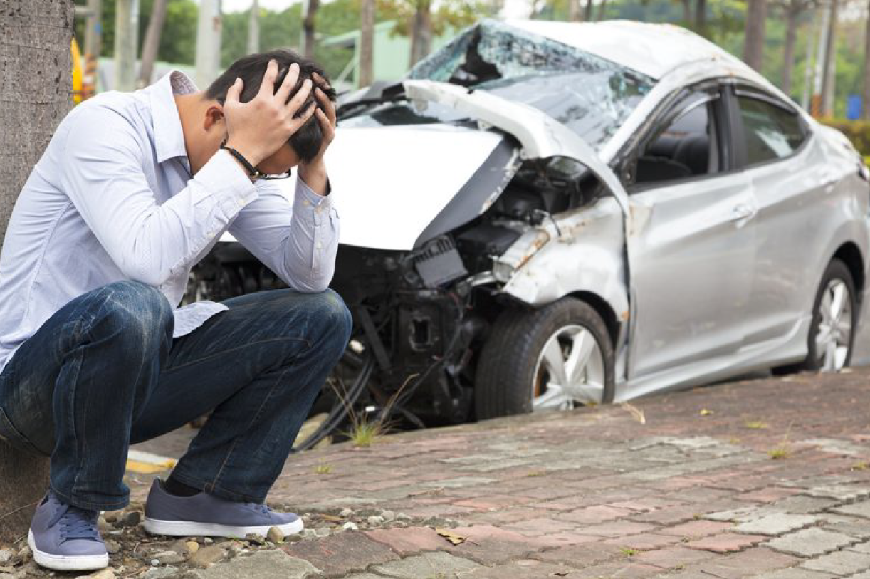 A Man and a Damaged Car — Florissant, MO — Teague & Associates, LLC A Man and a Damaged Car — Florissant, MO — Teague & Associates, LLC
