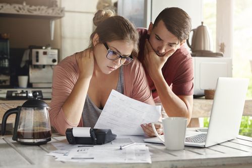 Husband And Wife Checking Bills — Florissant, MO — Teague & Associates, LLC