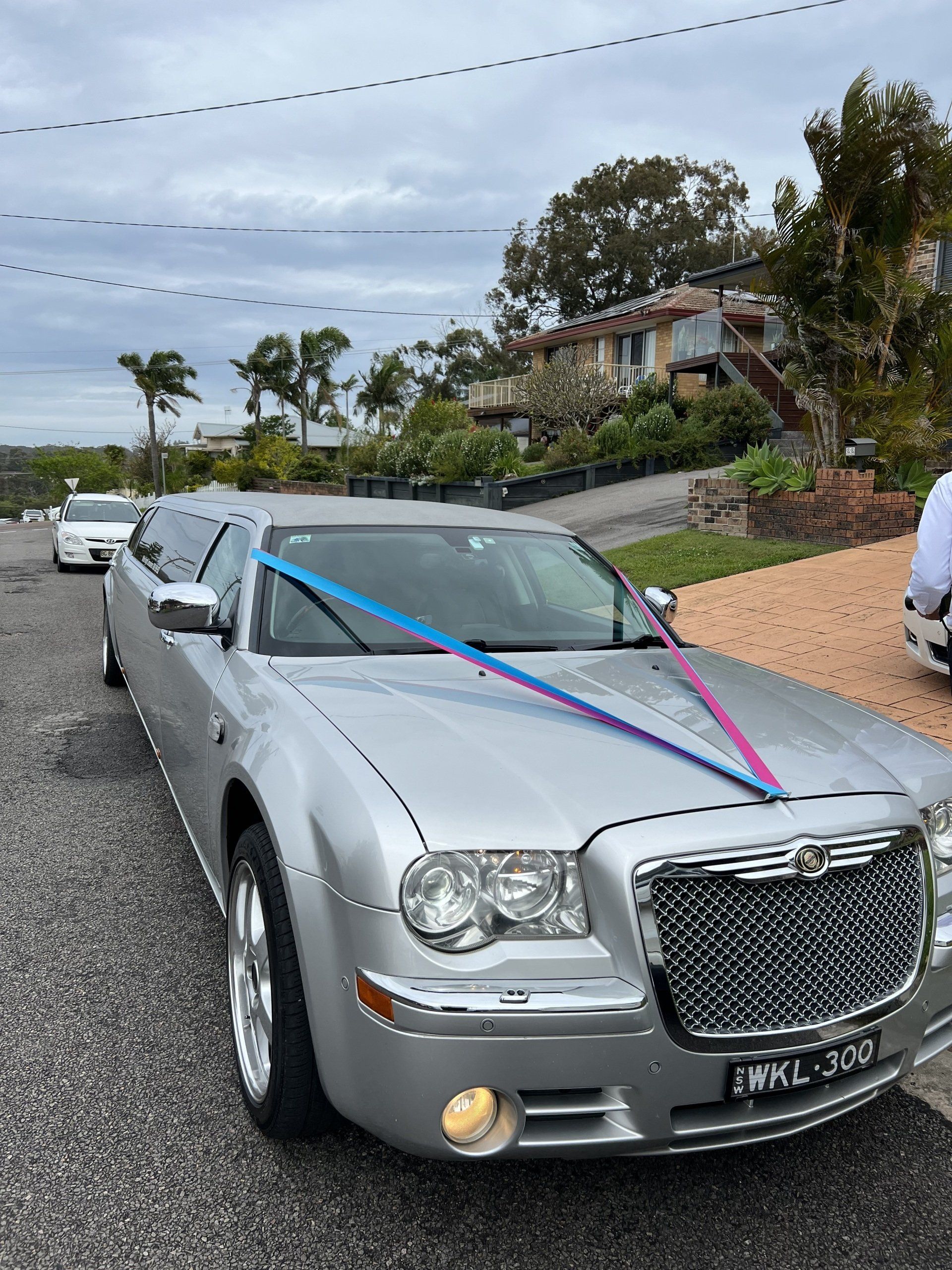 Father of the bride standing with bride — Limousine Hire in Central Coast, NSW