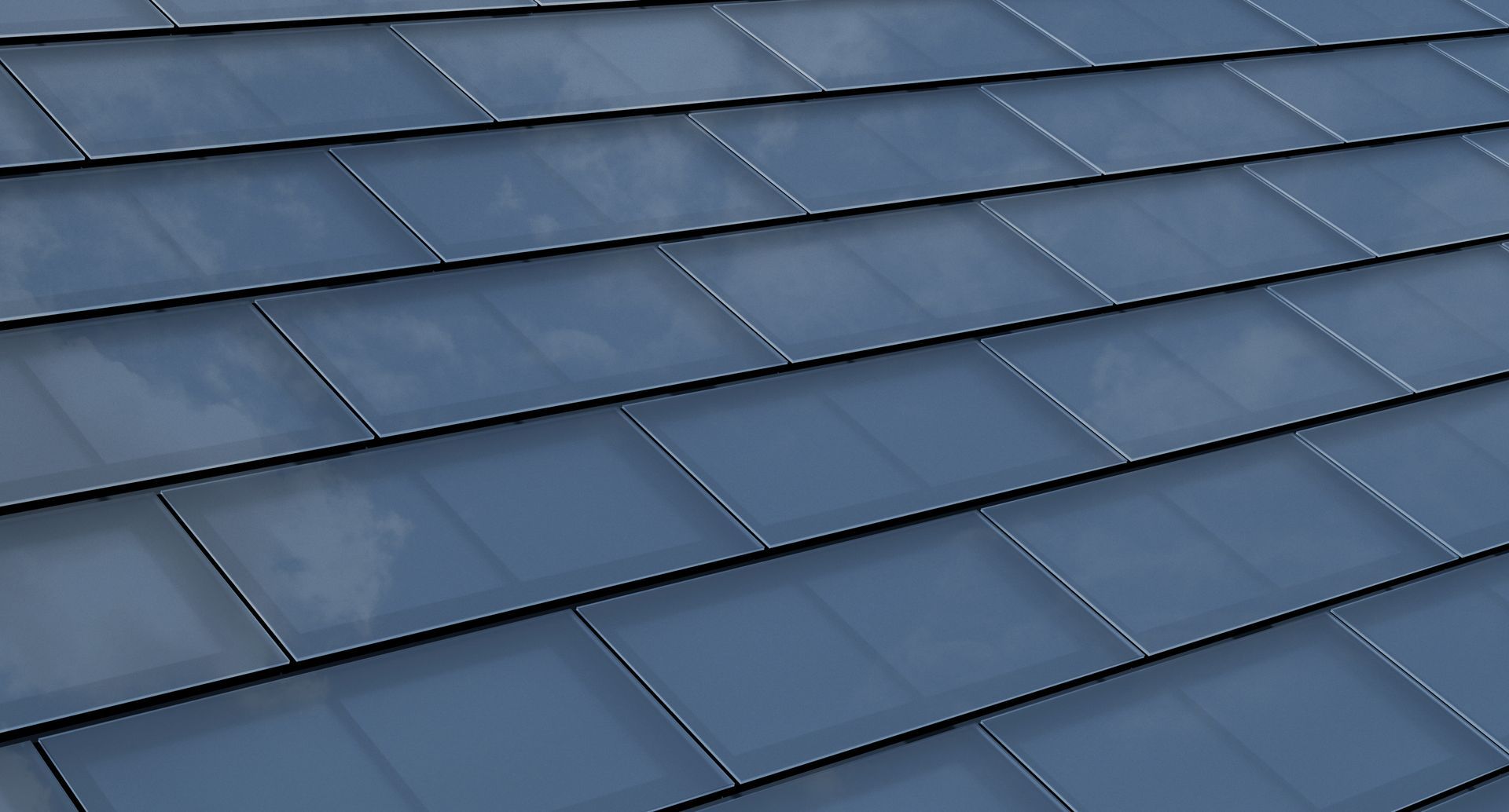A close up of a roof with blue tiles on it.