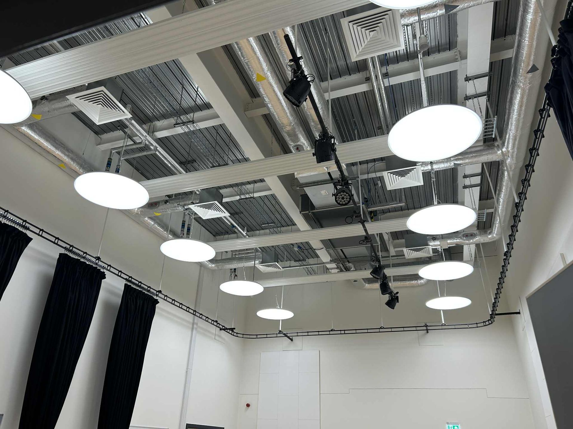 High level internal cleaning completed inside school hall using MEWP access