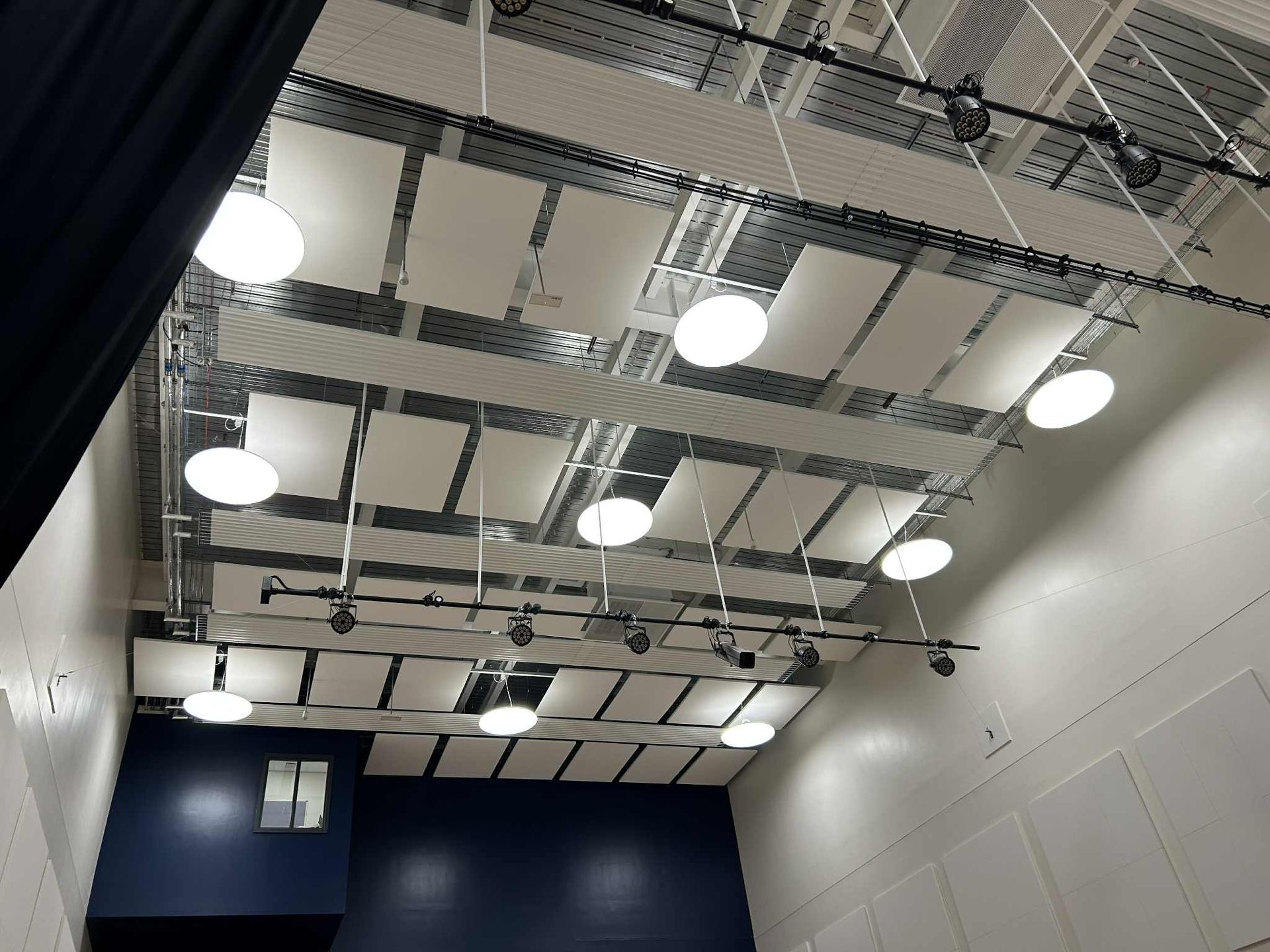 High-level ceiling cleaning inside Callerton Academy using specialist access equipment 