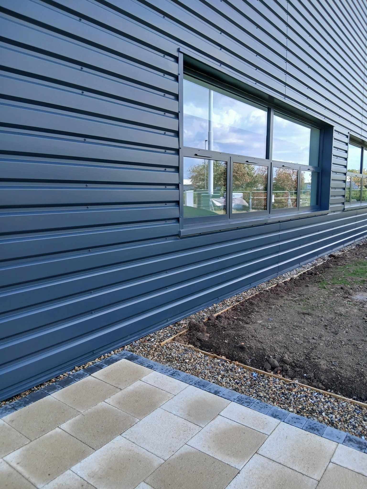 Clean external window and cladding