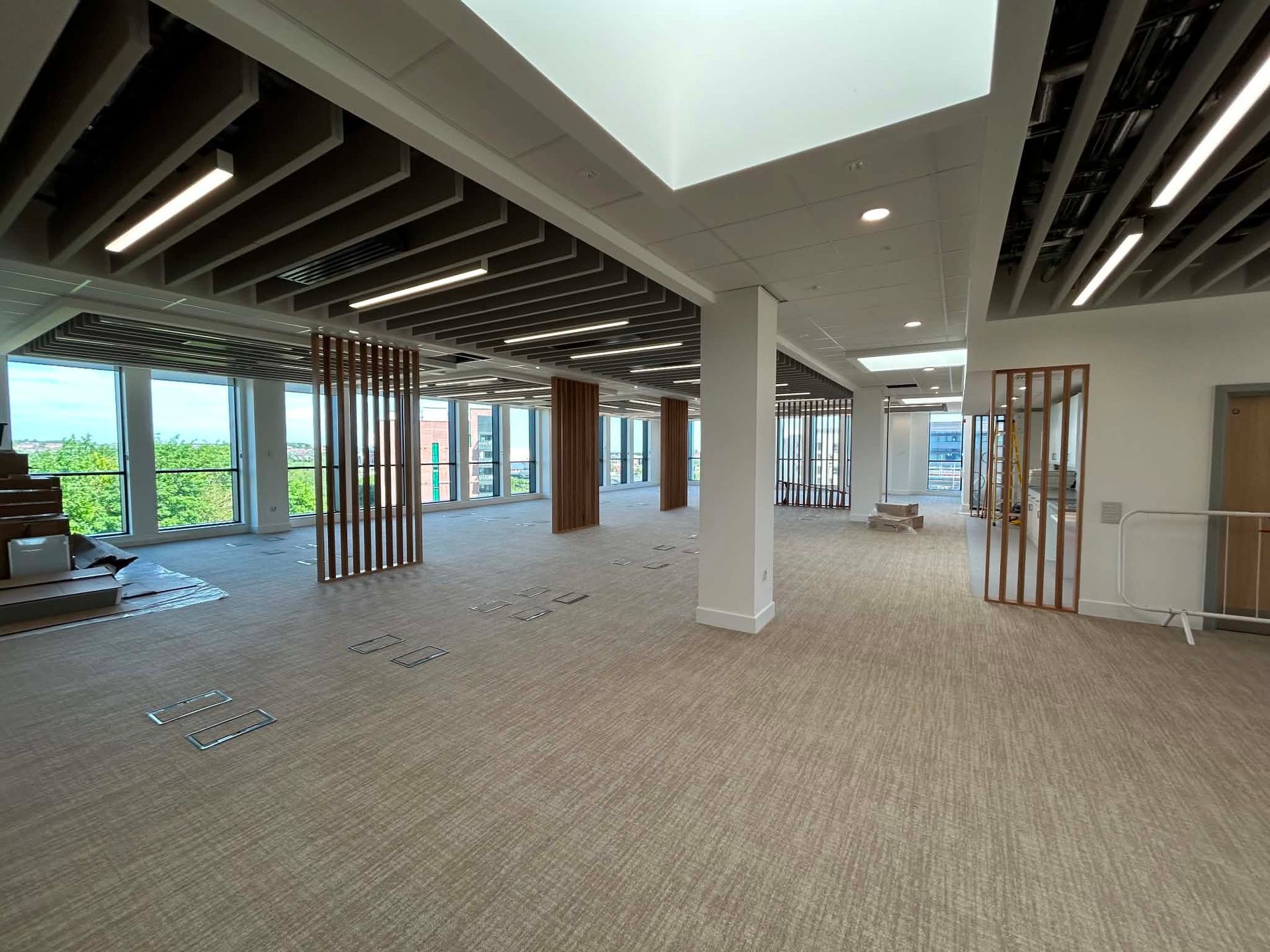 Open plan healthcare facility interior prepared for handover