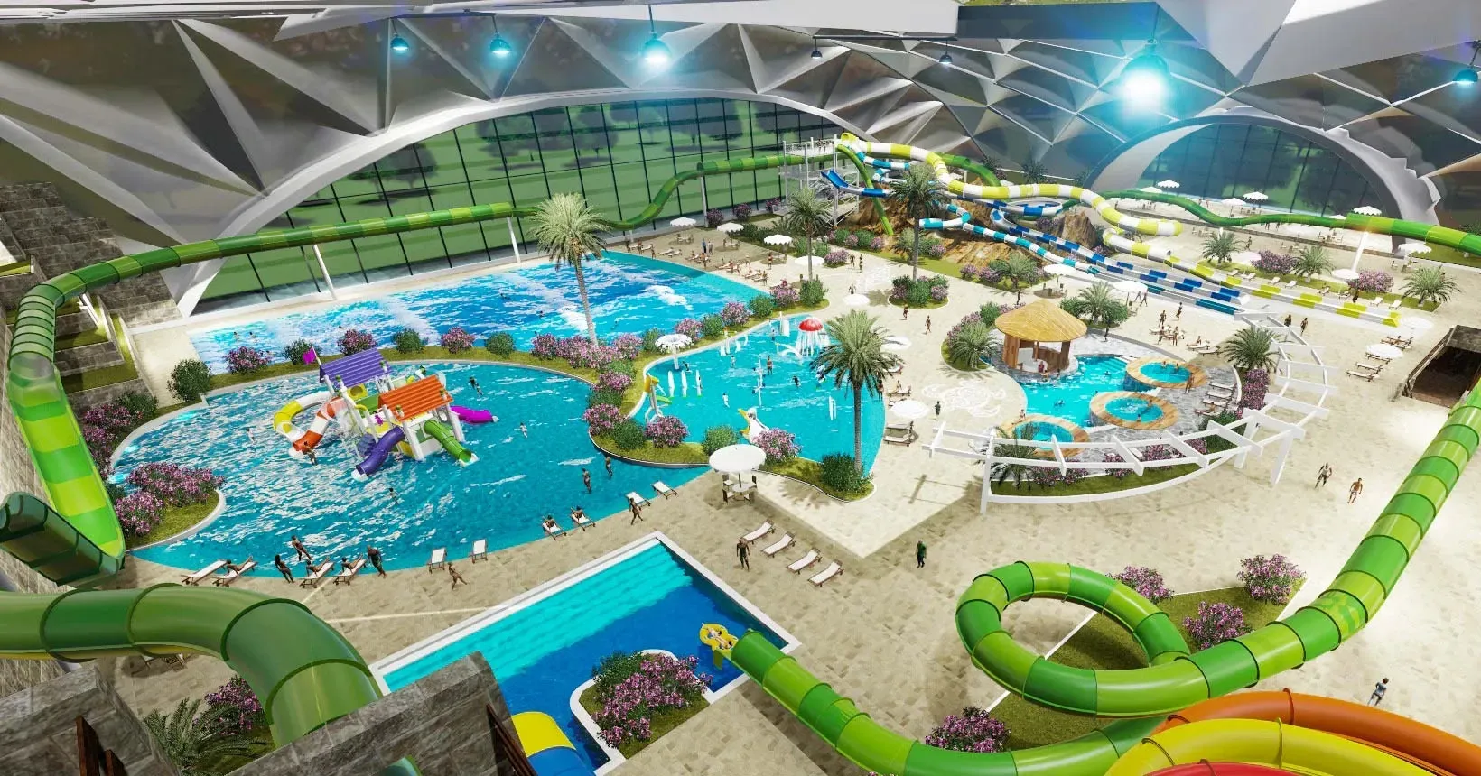 Vista aérea do parque aquático coberto Acquamotion em Gramado, com piscinas termais azuis, áreas infantis e grandes tobogãs.