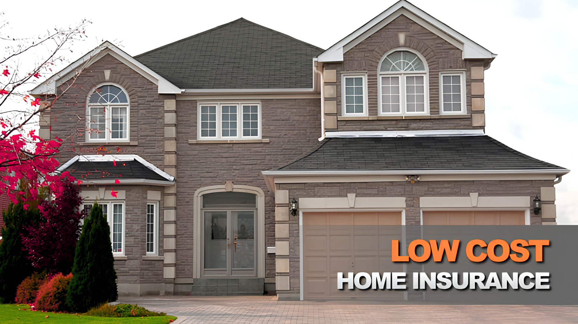 Two-story brick house with “LOW COST HOME INSURANCE” text on the front