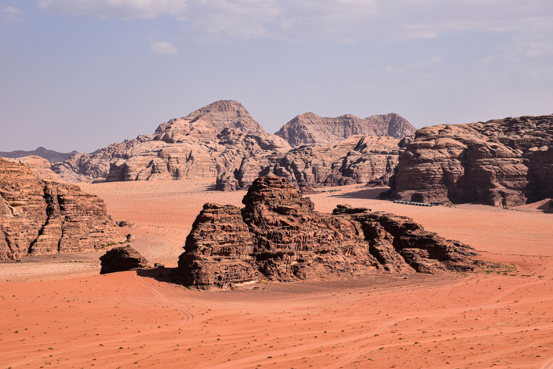 Panoramic view of Wadi Rum's red desert landscape resembling the surface of Mars