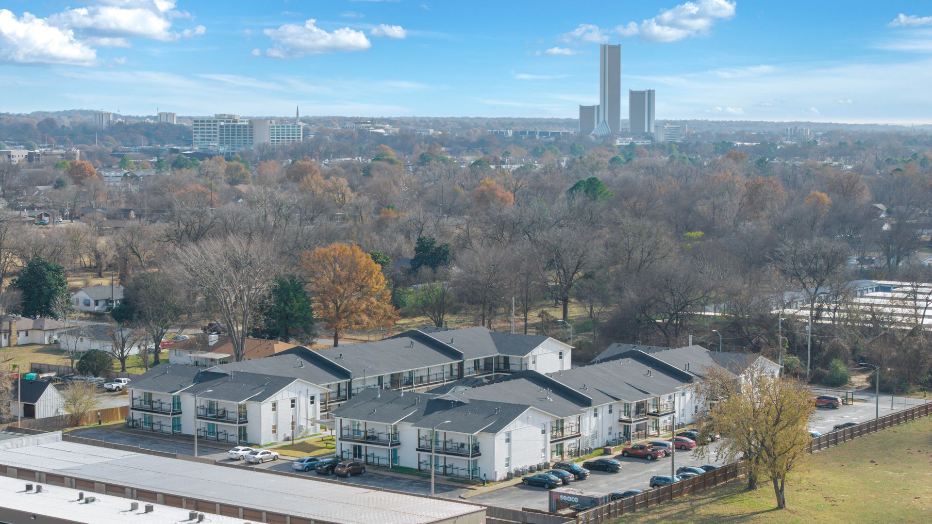 Property manager analyzing monthly financial reporting data, including rent collections and operating expenses, for a rental property managed by KSA Property Management in Tulsa