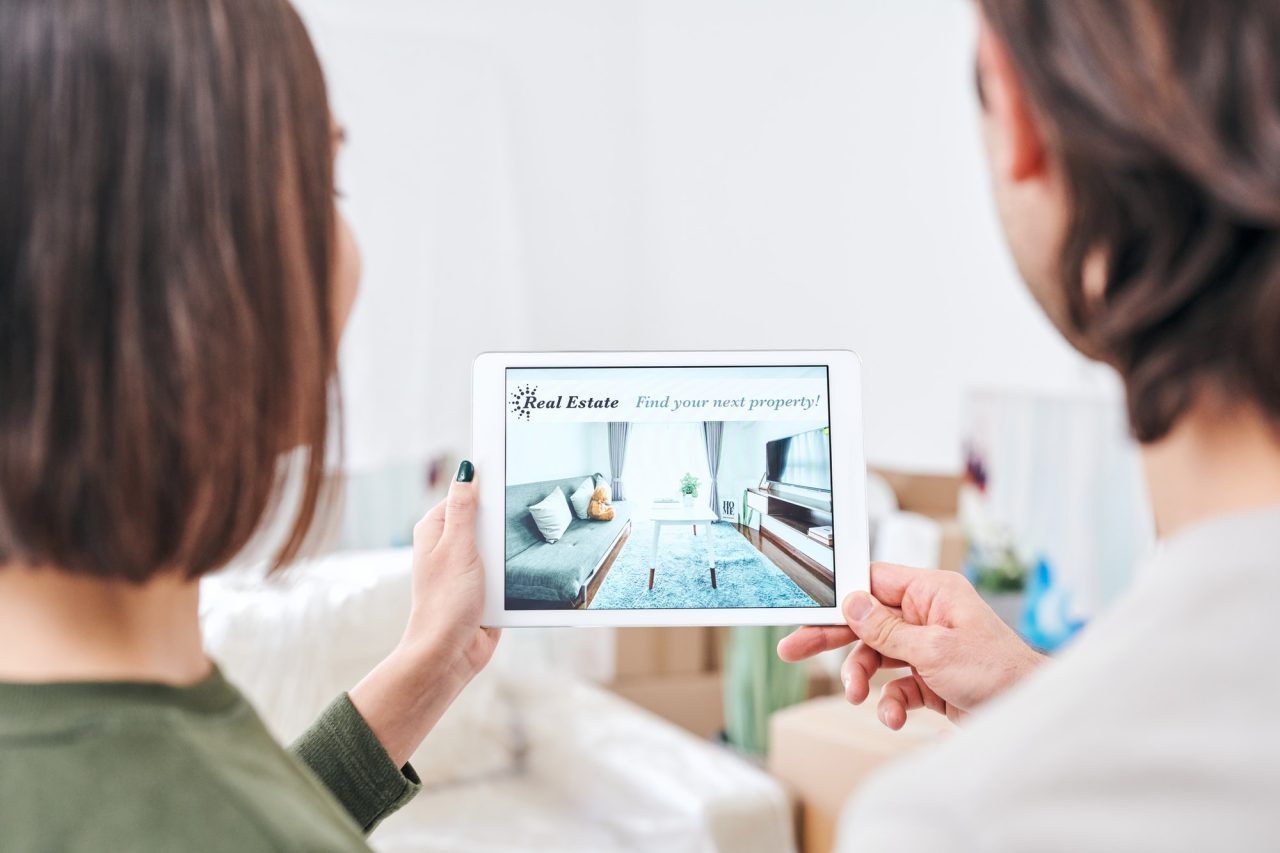 Property manager analyzing monthly financial reporting data, including rent collections and operating expenses, for a rental property managed by KSA Property Management in Tulsa
