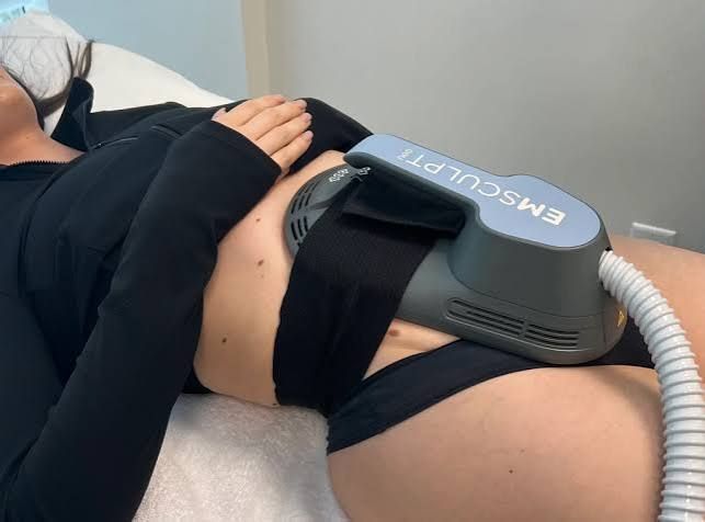 EMSCULPT NEO applicators positioned on a patient’s abdomen