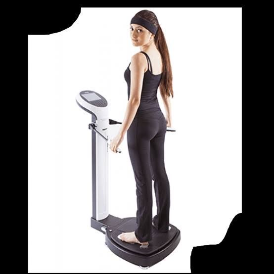 Patient completing an InBody body-composition assessment at Grace MedSpa