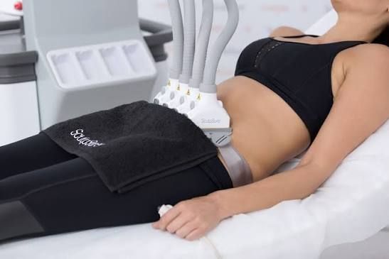 SculpSure laser fat-reduction applicators positioned on a patient’s abdomen
