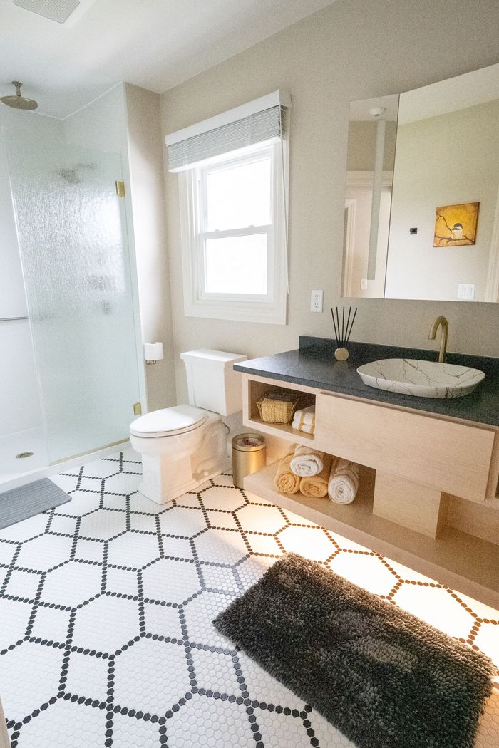 Golden bathroom with spa shower