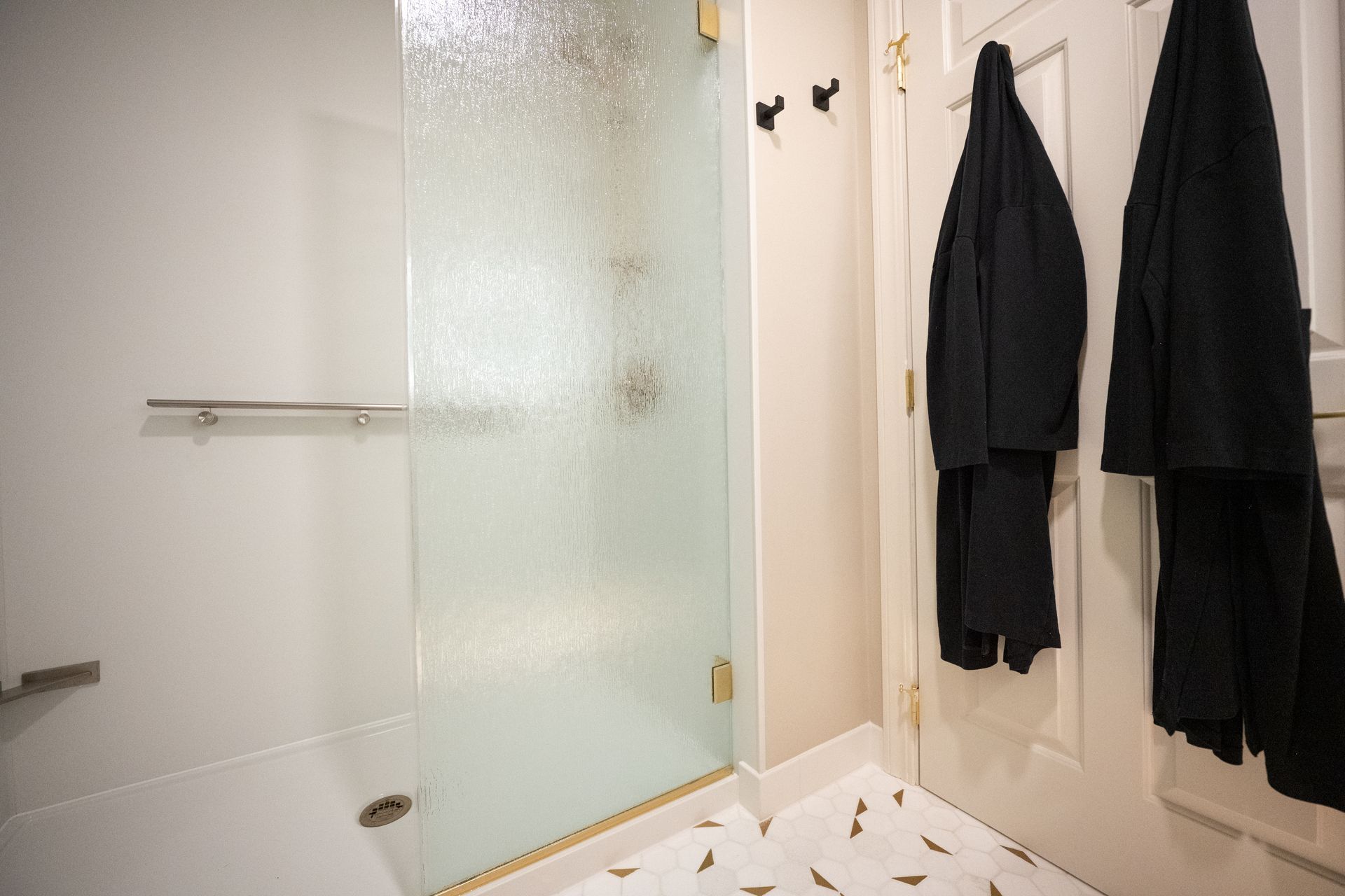 Honeycomb bathroom shower and robes