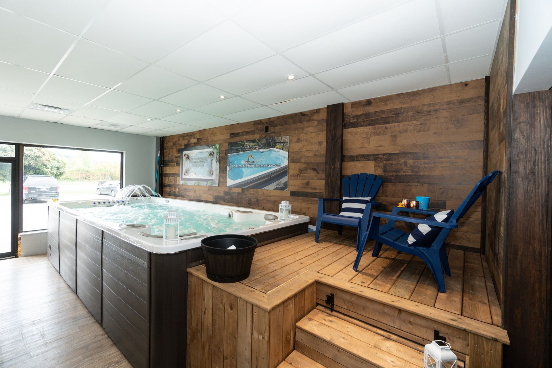 There is a large hot tub in the middle of the room.