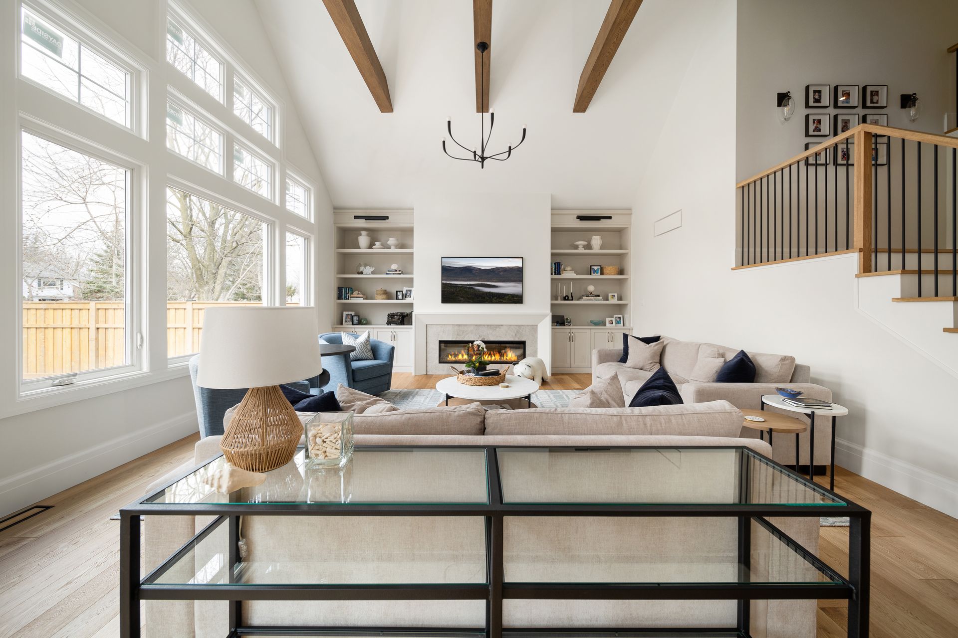 A living room filled with furniture and a fireplace.
