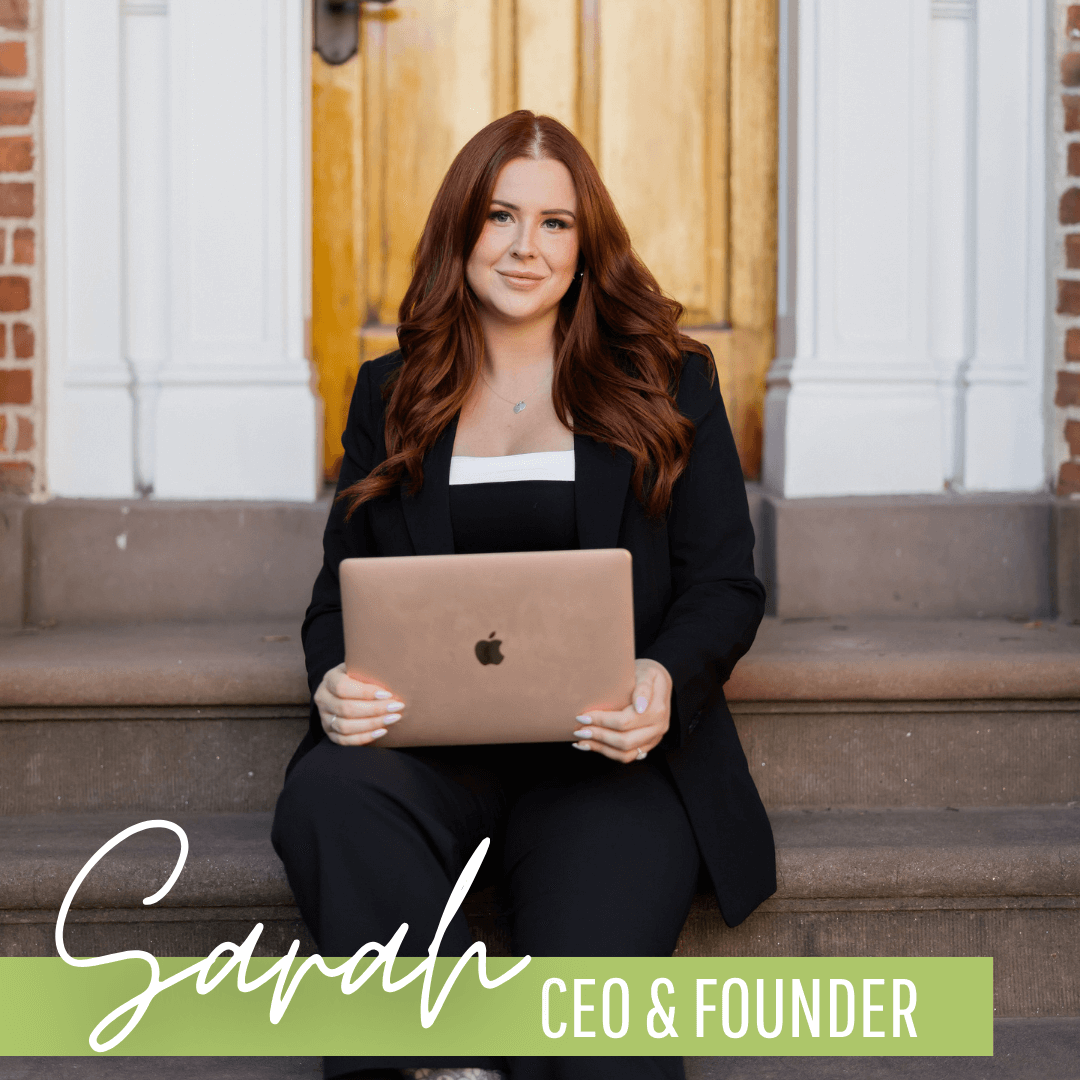 Sarah ceo and founder is sitting on the steps holding a laptop