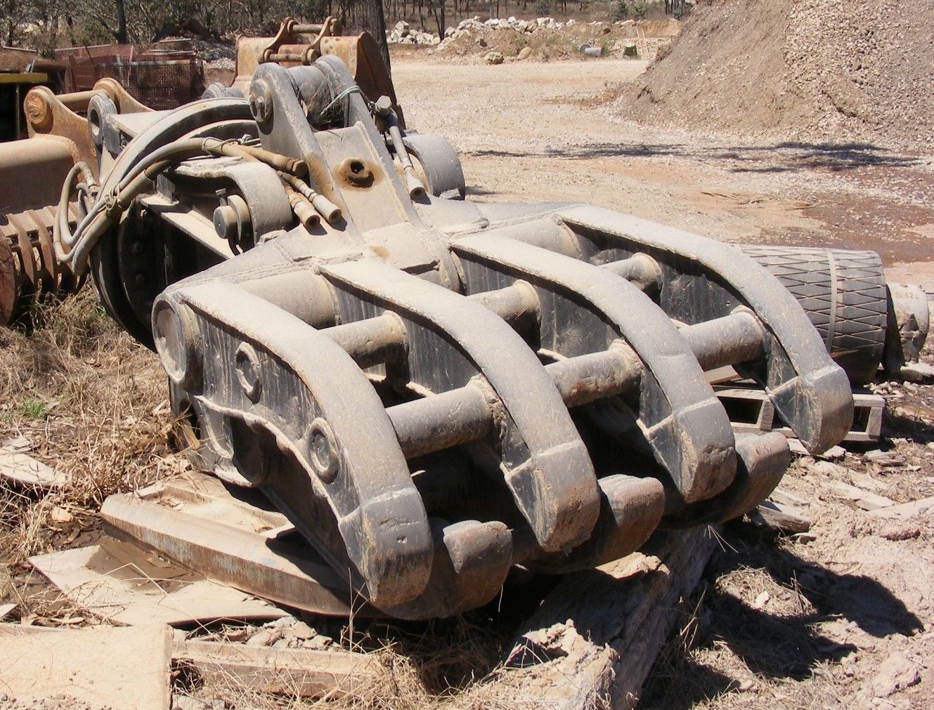 Dump Truck is Being Loaded With Rocks in a Quarry — W Wall & Sons in Nebo, QLD