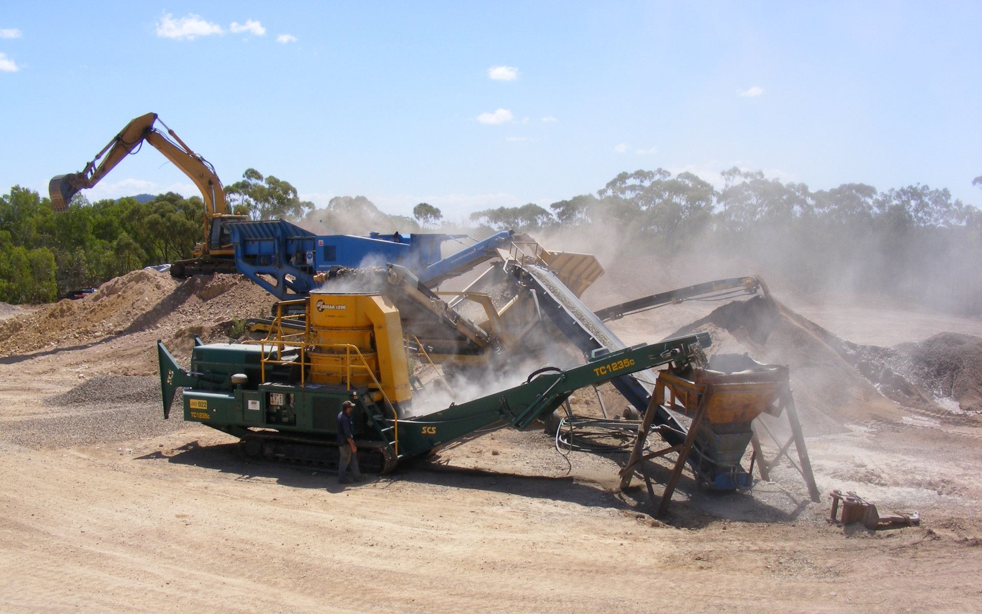 trucks in a quarry  — W Wall & Sons In Cannonvale, QLD
