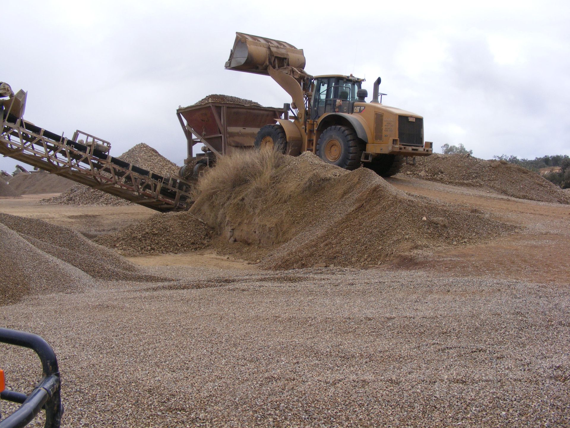A Bulldozer Is Moving Dirt On A Construction Site — W Wall & Sons In Marion, SA