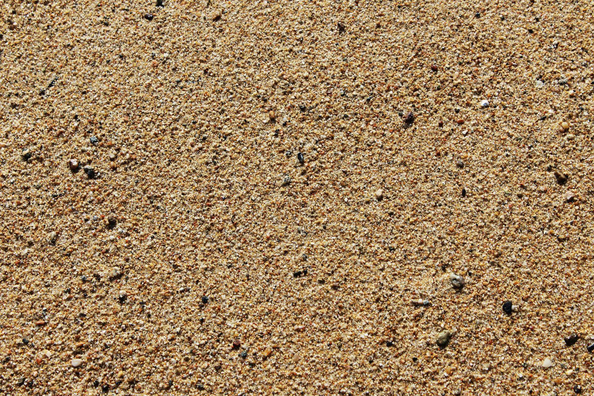 A Close Up Of A Pile Of Sand On A Beach — W Wall & Sons in Nebo, QLD