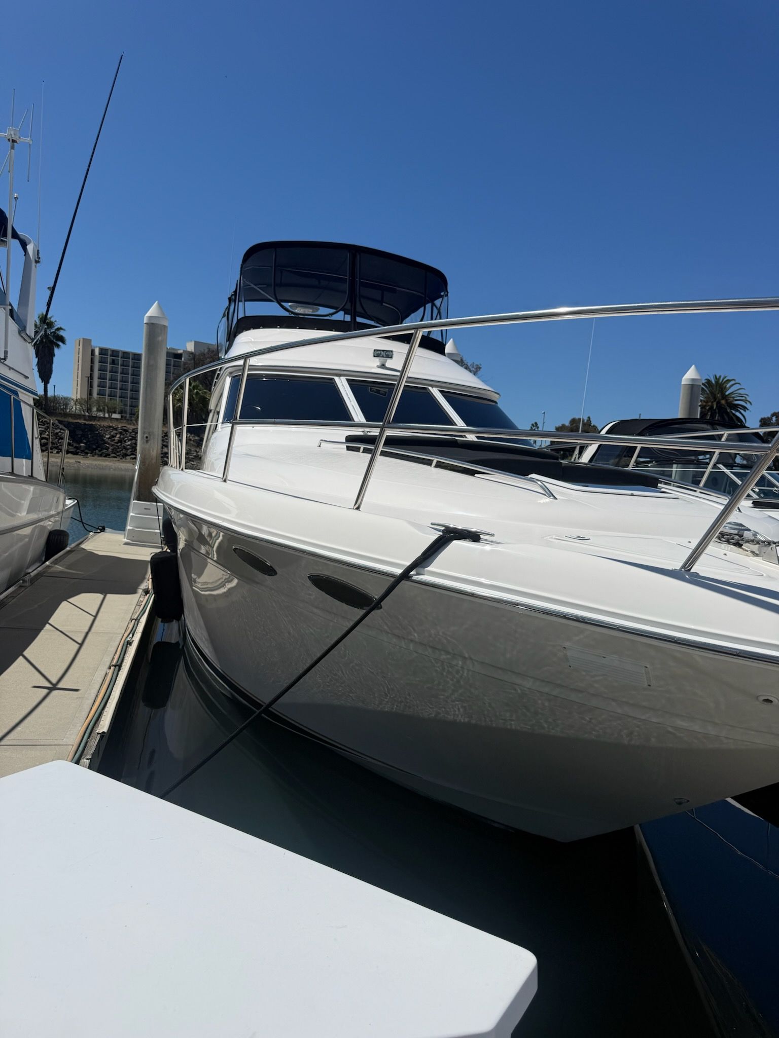 White motor yacht exterior after professional detailing by Blue Moon Yacht Services
