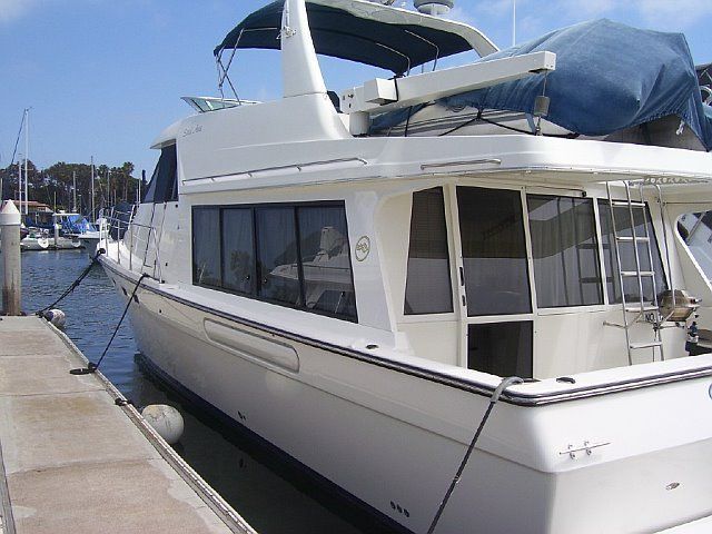 White yacht exterior with protected deck covering
