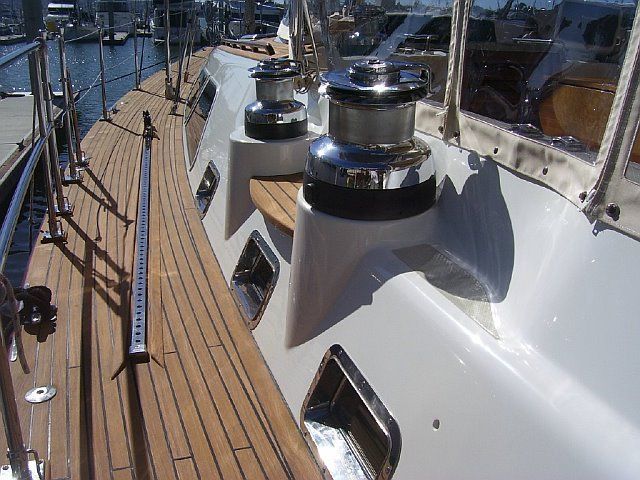 Restored teak yacht deck and polished stainless steel by Blue Moon Yacht Services