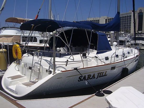 Clean sailboat hull docked at a San Diego marina