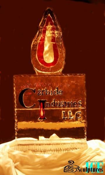 Golden trophy with red flame-like top and engraved text on a warm background.