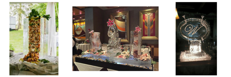 Three decorative floral arrangements with lights and glass accents on display tables