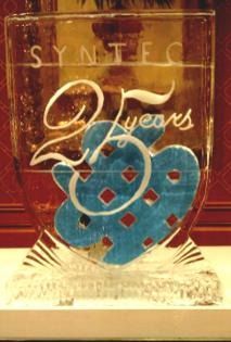 Decorative glass plaque with blue hearts and the words “2 years” on a gold background