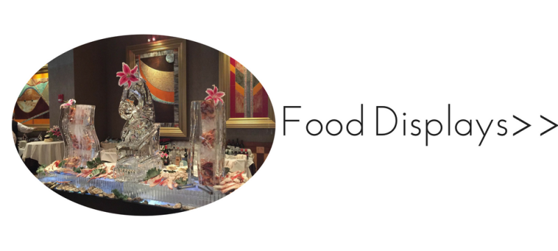 Food display sign with desserts, fruit, and drinks on a table