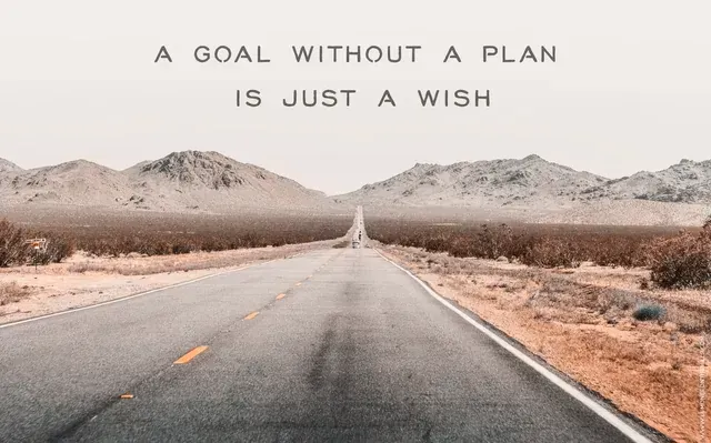 A road with mountains in the background and a quote that says, 'a goal without a plan is just a wish.'