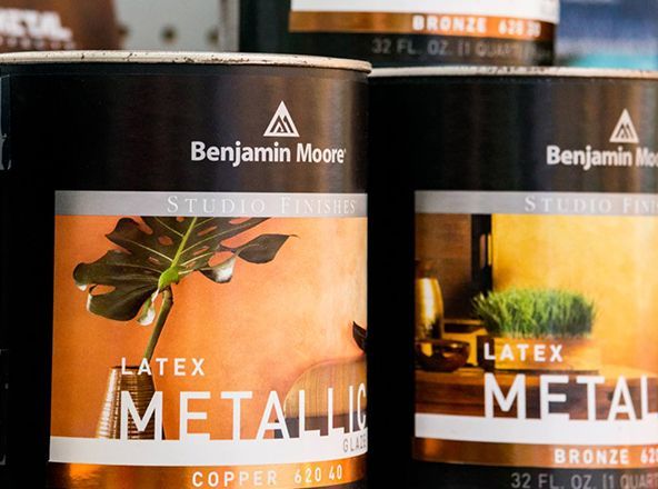 Two cans of benjamin moore latex metal paint.