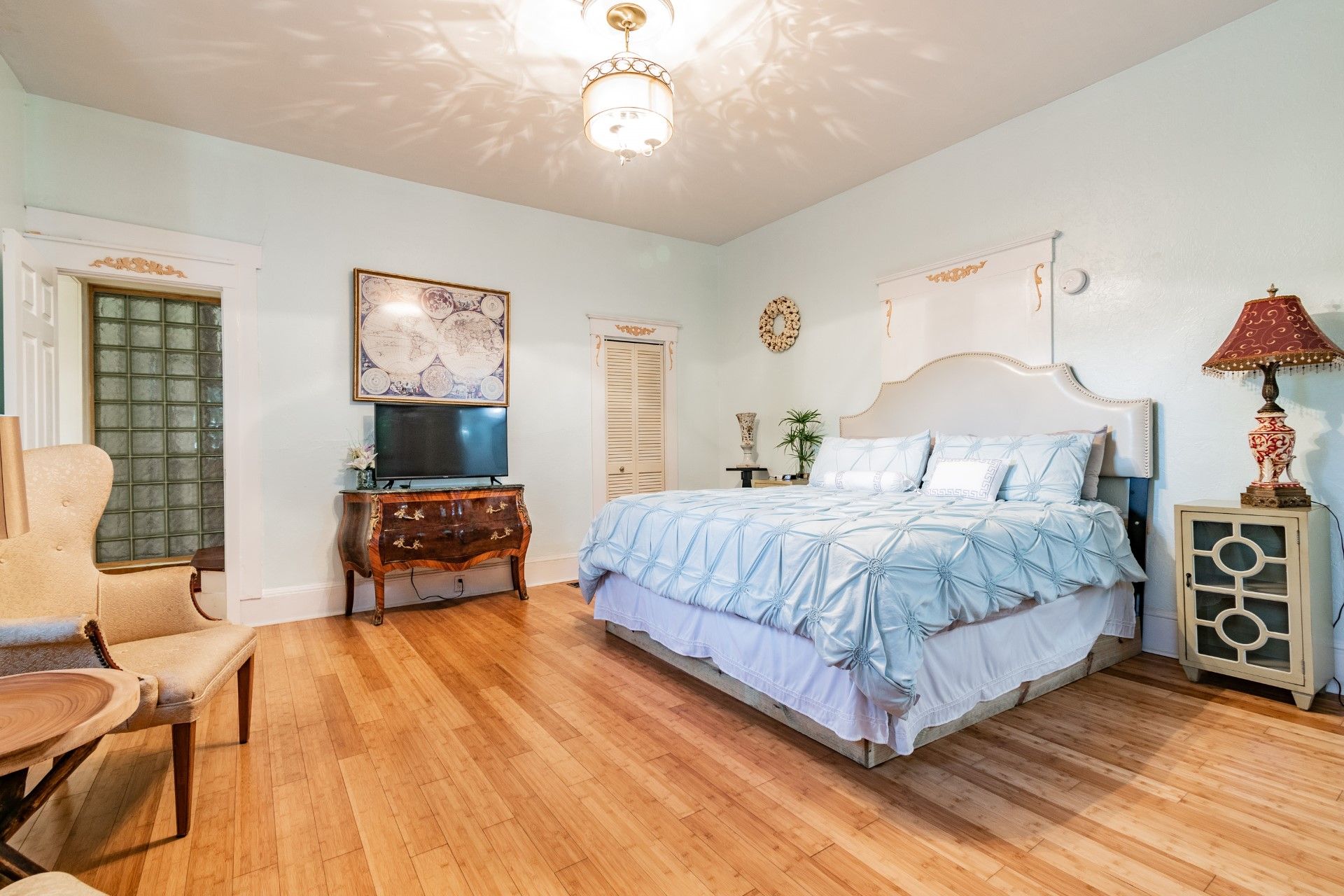 There is a large bed in the middle of the room.