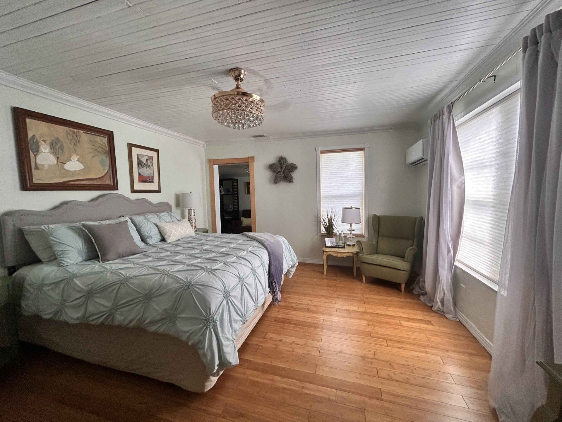 There is a large bed in the middle of the room.