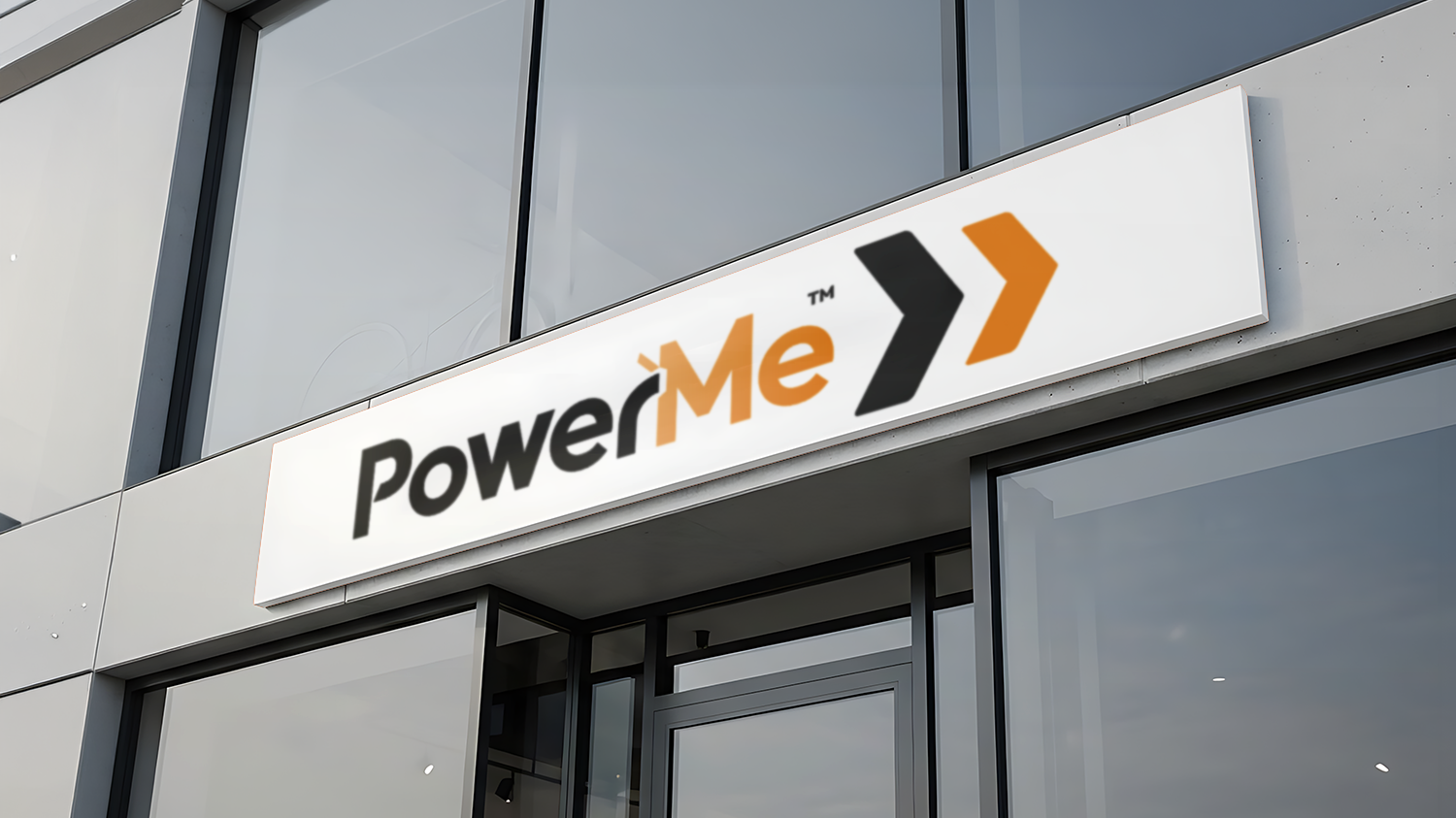 PowerMe storefront sign in black, white, and orange above glass entrance
