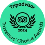 Tripadvisor Travellers' Choice Award badge for 2024; turquoise circle with owl logo and laurel wreath.