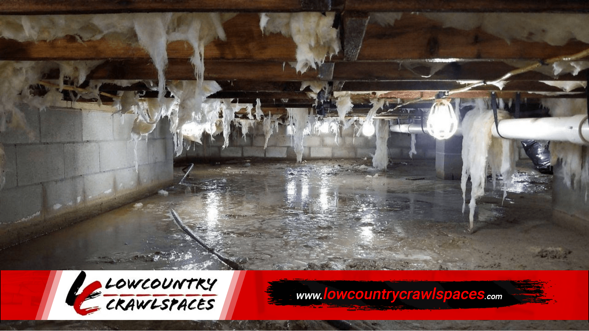 A crawlspace with a lot of water coming out of it.