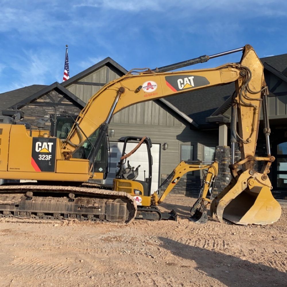 Experienced mining contractors operating machinery in a desert mining location.